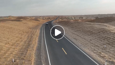 新疆：穿越“死亡之海”的沙漠公路正式通车.png